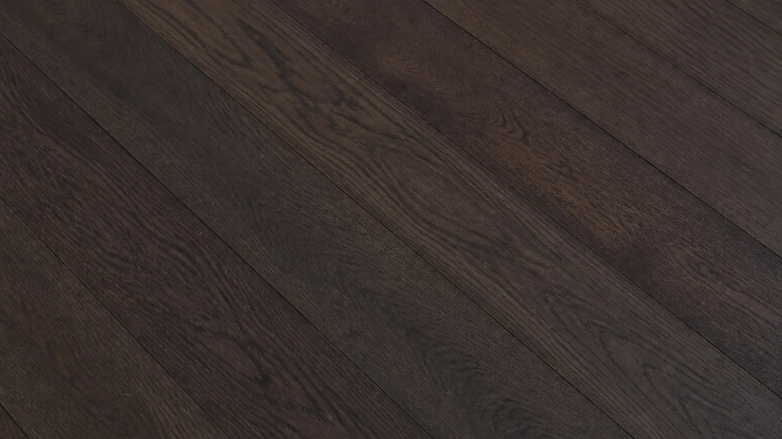 Close-up of freshly stained oak floorboards in a deep dark espresso brown, the grain still visible, the surface matte and not yet finished